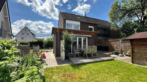 Ansicht Gartenseite - Einziehen statt renovieren - Modernisierte Doppelhaushälfte mit Garage