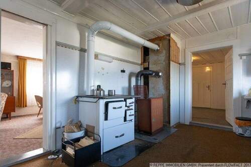 Küche im Obergeschoss mit Öl-Ofen - 