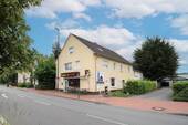 01 Haus - Mehrfamilienhaus mit 5 Wohneinheiten & Gewerbe in zentraler Lage - Investieren in Gütersloh!