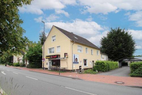 01 Haus - Mehrfamilienhaus mit 5 Wohneinheiten & Gewerbe in zentraler Lage - Investieren in Gütersloh!