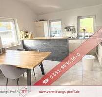 Trierweiler: Helle 2-Zimmer-Wohnung mit Südbalkon, Einbauküche und Holzofen mit perfekter Lux-Anbindung.