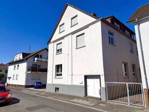 Seitanansicht - Mehrfamilienhaus, Wohnhaus mit 235,30 m&sup2; in Rodgau zum Kaufen