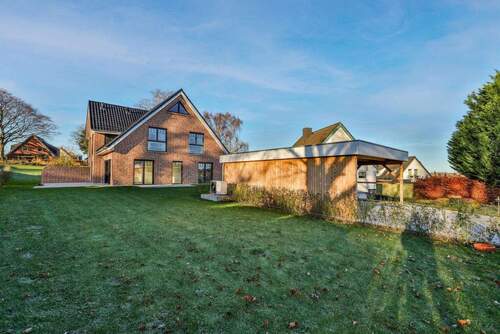 Garten vorderes Haus - Doppelhaushälfte mit 152,00 m² in Scharbeutz zum Kaufen