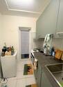 Kompkate Küche mit Zugang zur Terrasse (2) - 1 Zimmer Etagenwohnung zum Kaufen in Stuttgart