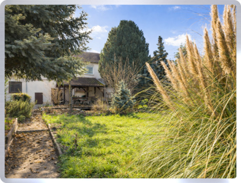 Gartenansicht - Einfamilienhaus mit 127,50 m&sup2; in Geisenheim zum Kaufen