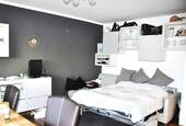 Wohnzimmer 2 - 1 Zimmer Etagenwohnung in München