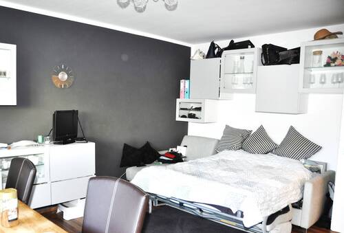 Wohnzimmer 2 - 1 Zimmer Etagenwohnung in München