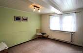 Wohnzimmer EG - 4 Zimmer Einfamilienhaus zum Kaufen in Kammerforst