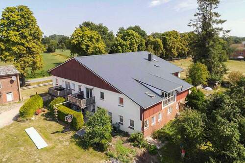 Außenansicht - Für Anleger: Voll vermietetes MFH mit 6 WE und 1 GE und großzügigem Grundstück