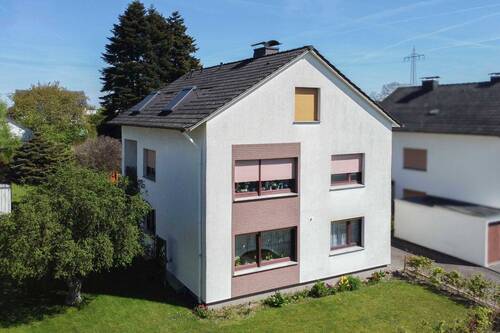 Ansicht - Pelletheizung & Dämmung: Zweifamilienhaus mit ausgebautem DG & Doppelgarage in Besenkamp