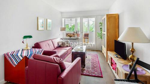 Wohnzimmer 1 - Ihr maritimer Rückzugsort: Modernisierte 1,5-Zimmer-Wohnung in strandnaher Lage