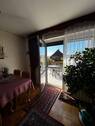 Wohnzimmer mit Ausgang zur Terrasse - 