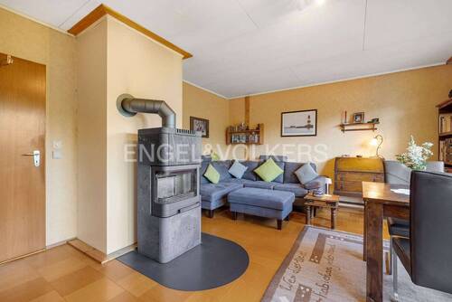 Wohnbereich mit Kamin - Einfamilienhaus mit 112,00 m² in Sievershütten zum Kaufen