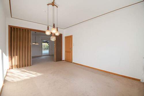 Wohnzimmer - Einfamilienhaus mit 163,30 m&sup2; in Edewecht zum Kaufen