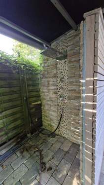 Ruhebereich im Saunahaus mit Kamin - 