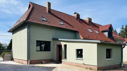 rückwärtige Gebäudeansicht - Doppelhaushälfte mit 130,00 m&sup2; in Kröpelin zum Kaufen