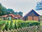 Außenansicht - 1 Zimmer Mehrfamilienhaus, Wohnhaus zum Kaufen in Munster