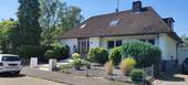 Hausansicht - Freistehendes Einfamilienhaus mit vermieteter Einliegerwohnung