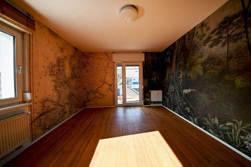 Wohnzimmer mit Balkon
- 2 Zimmer Etagenwohnung in Karlsruhe