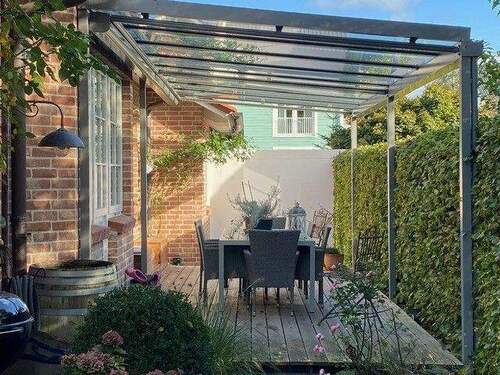 Geschützte seitliche Terrasse - 