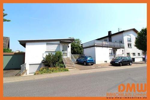 Bild 1 - San. u renov. 1 ZKB, TL Bad m Du, kl. Terrasse u Vorgarten, PKW-Stellpl, m EBK