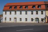 Hausansicht - 1 Zimmer Mehrfamilienhaus, Wohnhaus zum Kaufen in Torgau