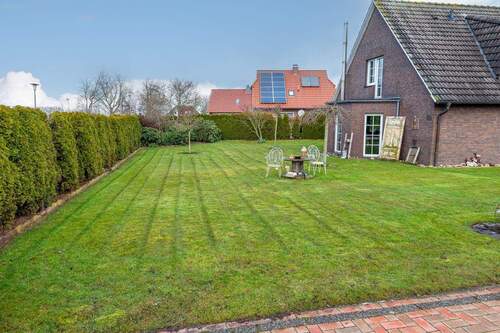 Garten - Einfamilienhaus mit 139,00 m&sup2; in Hinte zum Kaufen