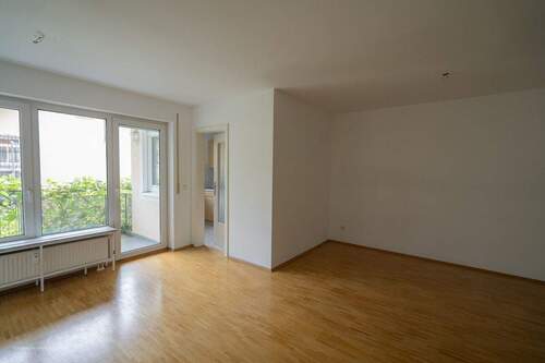 Wohnzimmer - Etagenwohnung mit 53,50 m² in Unterhaching zum Kaufen