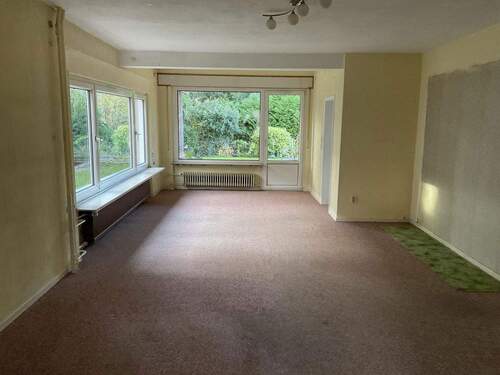 Wohnzimmer-1_EG - Einfamilienhaus mit 195,00 m&sup2; in Hanau zum Kaufen