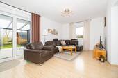 Wohnzimmer - 4 Zimmer Einfamilienhaus zum Kaufen in Burglauer