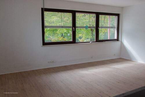 Wohnzimmer - Etagenwohnung mit 84,00 m² in Unterhaching zum Kaufen