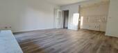 Wohnzimmer mit Küche - Etagenwohnung mit 63,60 m&sup2; in Paderborn OT Schloß Neuhaus zur Miete