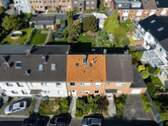 Drohnenansicht Frontseite - Reihenmittelhaus mit 99,00 m² in Kaarst / Büttgen zum Kaufen