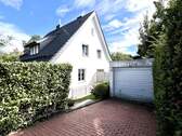 Hausansicht mit Garage - Einfamilienhaus mit 192,10 m² in Horn-Bad Meinberg zum Kaufen