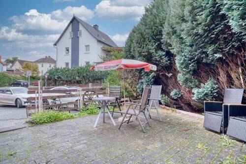 Freisitz - 5 Zimmer Mehrfamilienhaus, Wohnhaus in Solms / Burgsolms