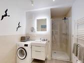 modernes Duschbad mit Waschmaschine - Etagenwohnung mit 53,00 m&sup2; in Ostseeheilbad Zingst zum Kaufen