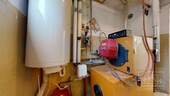 EG - Heizraum mit Zentralheizung und Warmwasserboiler - 