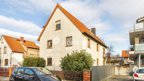 Außenansicht 2 - Großzügiges Einfamilienhaus mit Garten in ruhiger Lage: Perfekt für Mehrgenerationen-Wohnen