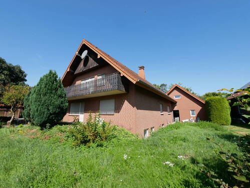 Ansicht Straße - Zweifamilienhaus mit großem Garten und zusätzlichem Baupotenzial in Salzkotten-Niederntudorf