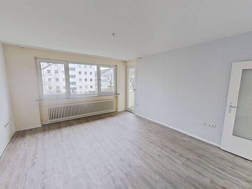Ansicht I: Wohn- und Esszimmer - Großzügig geschnittene 3-Zimmer-Wohnung mit BALKON