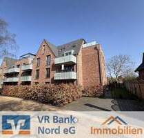 Im Zentrum von Niebüll - Exklusive 3-Zi.-Eigentumswohnung mit Gartenanteil und 2 Stellplätzen