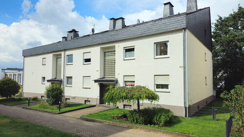 Vorderansicht - Gut vermietete 2-Zimmer-Dachgeschosswohnung mit Balkon u. Garage im Herzen von Burscheid