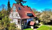Gartenansicht - alles 'außer-gewöhnlich' - ruhige, sonnige Lage mit herrlichem Ausblick !