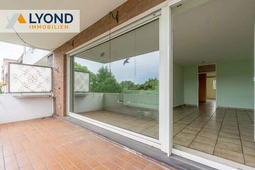 Bild 1 - Moderne 2,5-Zimmer-Eigentumswohnung mit Balkon & TG-Stellplätzen in Moers!