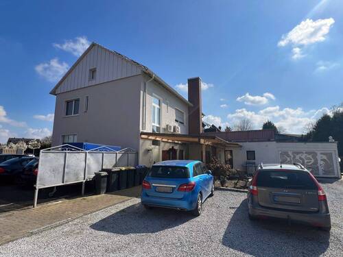 Seitenansicht - 8 Zimmer Mehrfamilienhaus, Wohnhaus zum Kaufen in Lünen