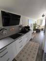 Moderne L-Küche - Etagenwohnung mit 60,20 m&sup2; in Rodenbach zum Kaufen