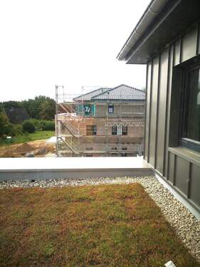 Blick zu Haus 1 - 3 Zimmer Etagenwohnung in Travenbrück