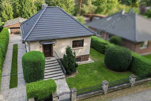 Luftbildansicht - Charmanter, bezugsfreier Bungalow mit Ausbaupotenzial im Dachgeschoss und großem Garten in Falkensee