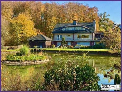 Hausansicht vom Garten - Drei Wohneinheiten, Erdgeschoss und Dachgeschoss wohnen mit der Familie und Souterrain Wohnung evtl. vermieten?