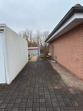 Durchgang Haus/Garage - Bungalow mit 129,00 m&sup2; in Wulften am Harz zum Kaufen
